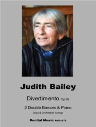 Photograph of composer Judith Bailey on a music book titled Divertimento Op. 92 2 Double Basses & Piano (Solo & Orchestral Tuning) Recital Music RMD1572. The background colour is grey.