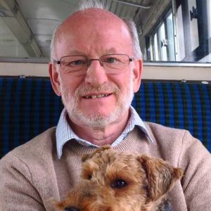 Photo of the composer Chris Allen with his dog.
