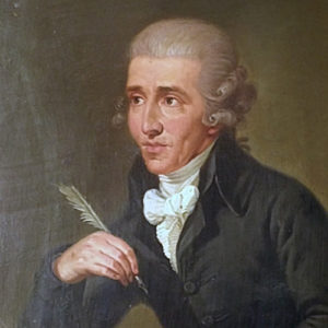 Portrait of Austrian composer Franz Joseph Haydn holding a quill.