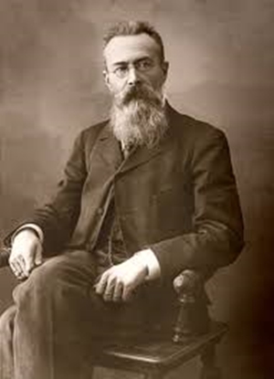 Sepia portrait of Russian composer Nikolai Rimsky-Korsakov sitting down