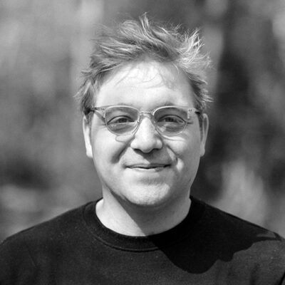 Black and white photograph of composer Samuel Pegg